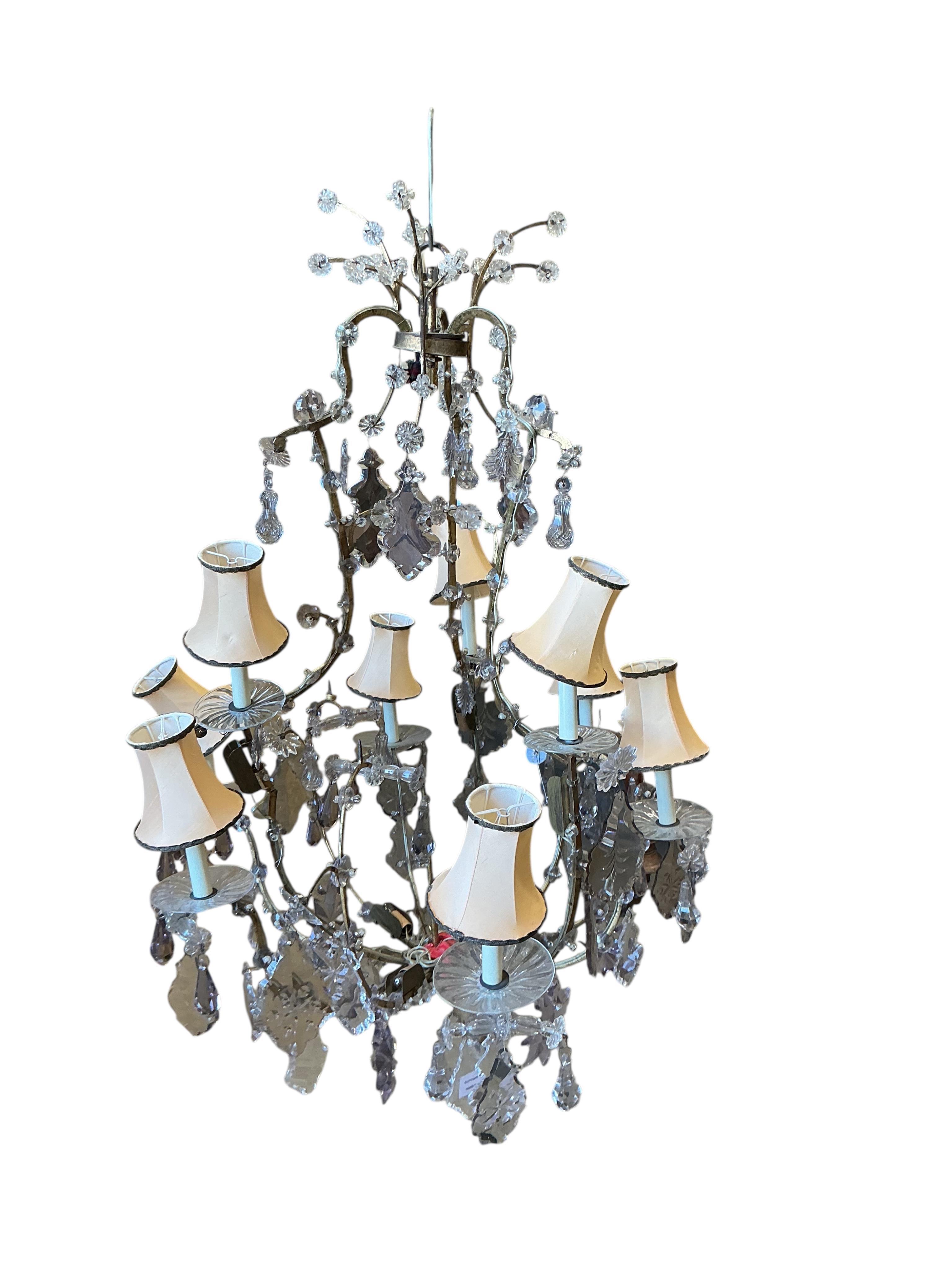 A 19th century French gilt metal and cut glass 12 branch chandelier, converted to electricity, height 108cm